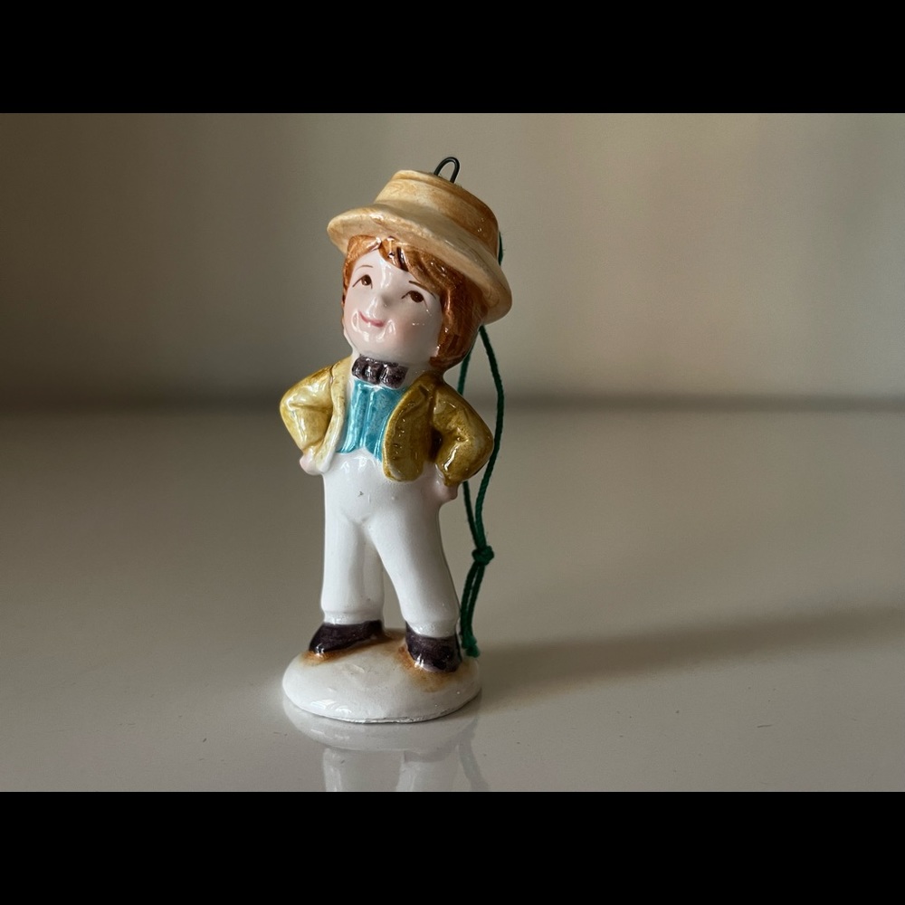 A company of friends ceramic ornament. 3” tall. Cute cheeky little lad. Great!